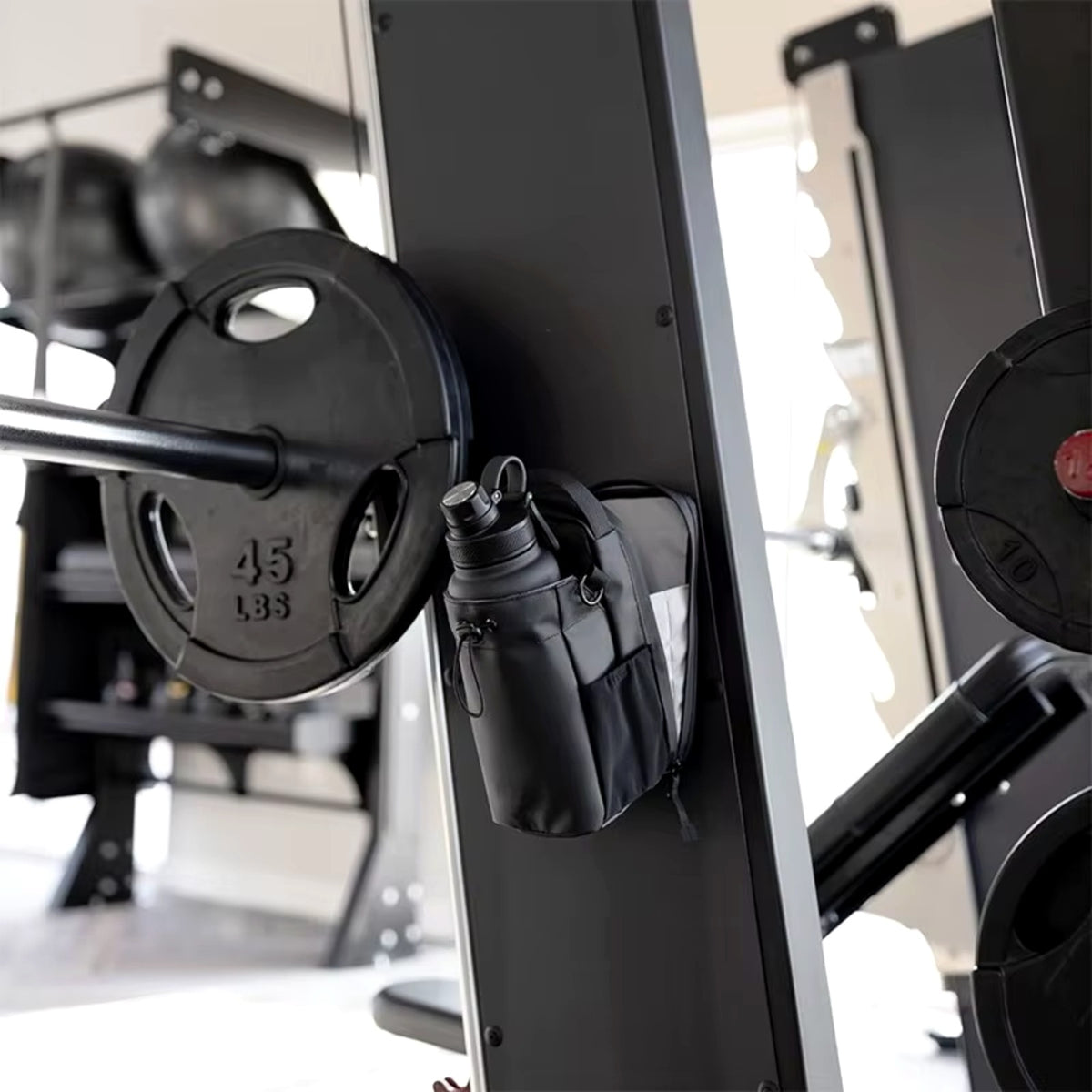 Magnetic gym bag on a squat rack