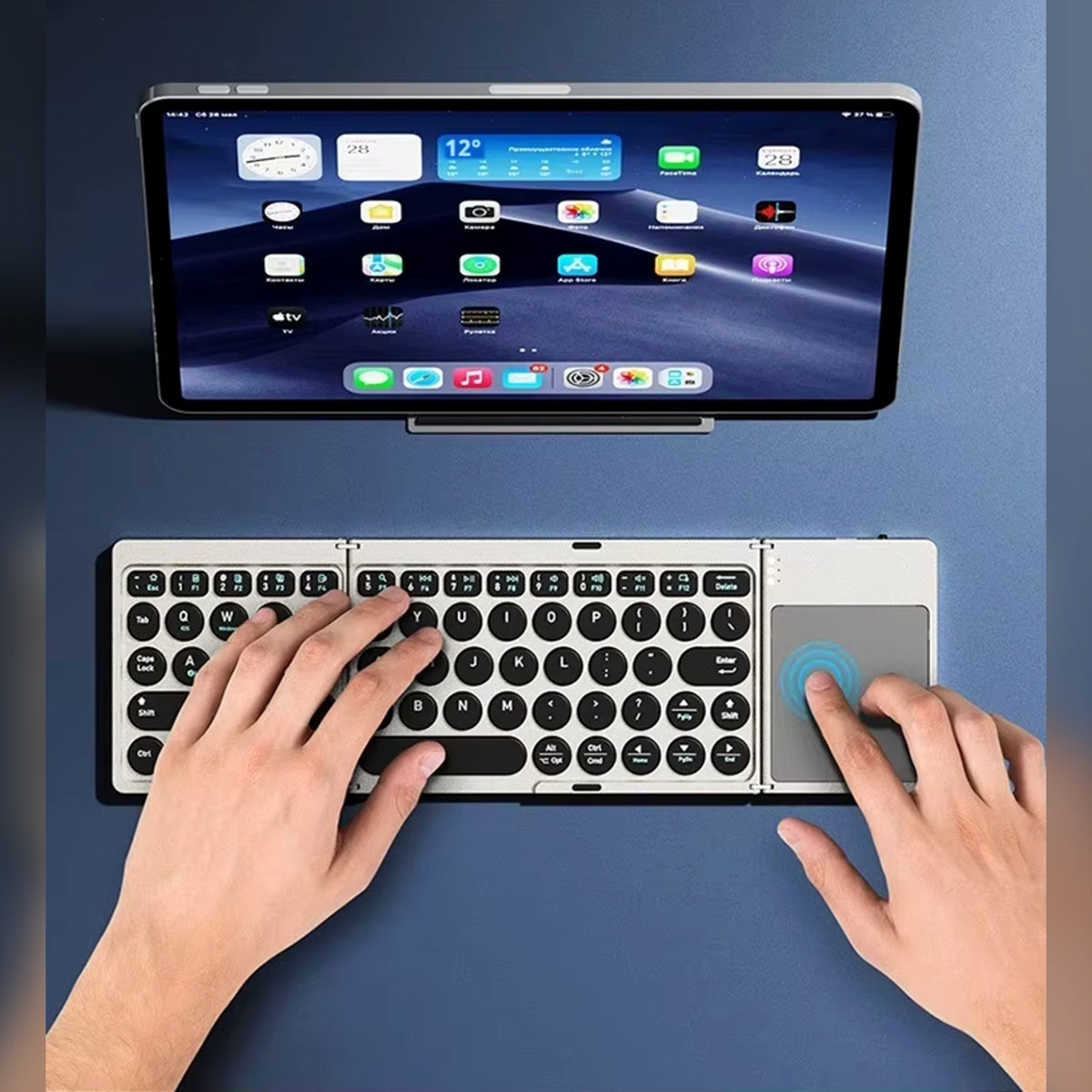 Typing on the tri-fold keyboard with a tablet